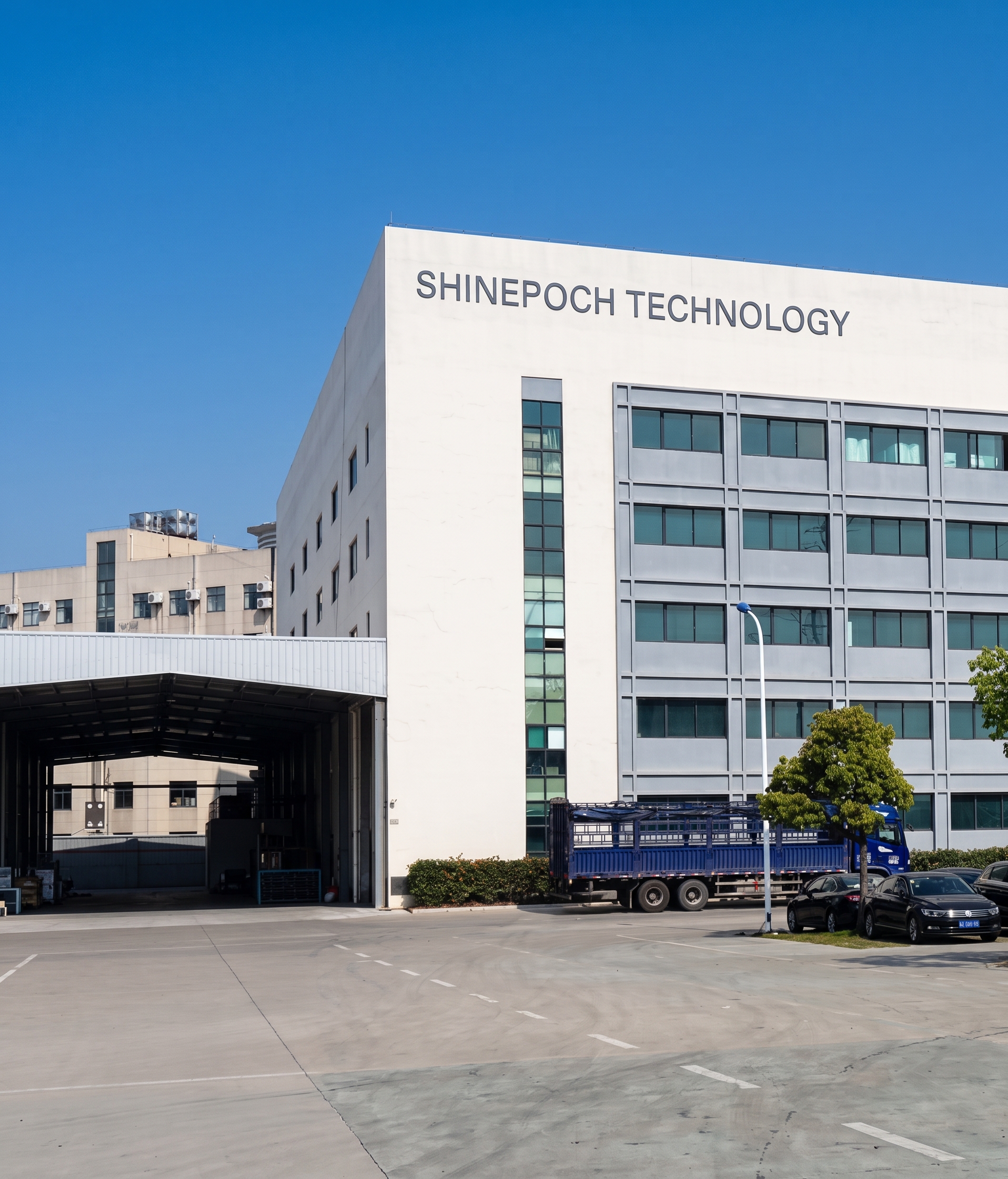 Factory building displaying the Shinepoch Technology name associated with SEFIRE fireplace production