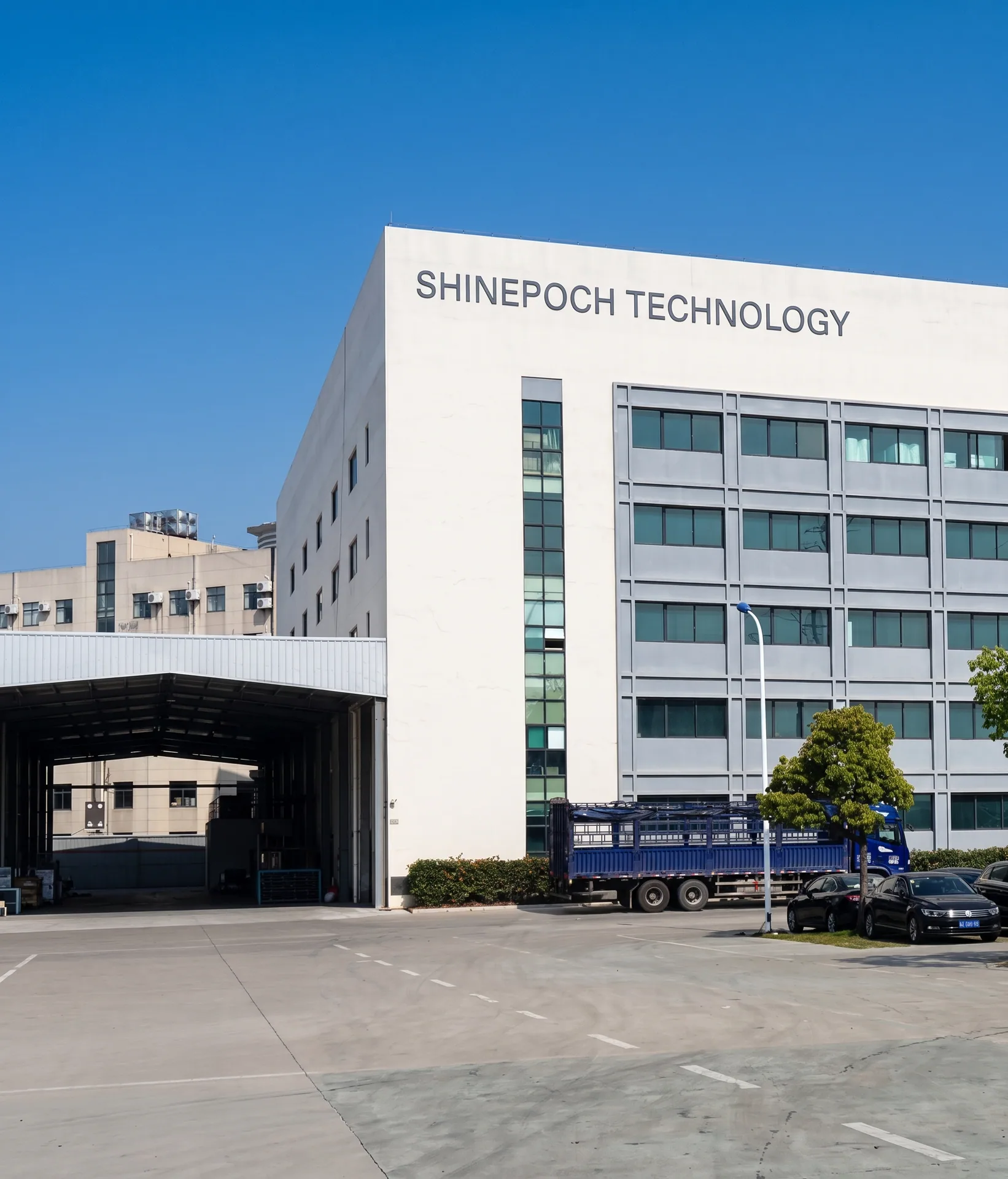 Factory building displaying the Shinepoch Technology name associated with SEFIRE fireplace production